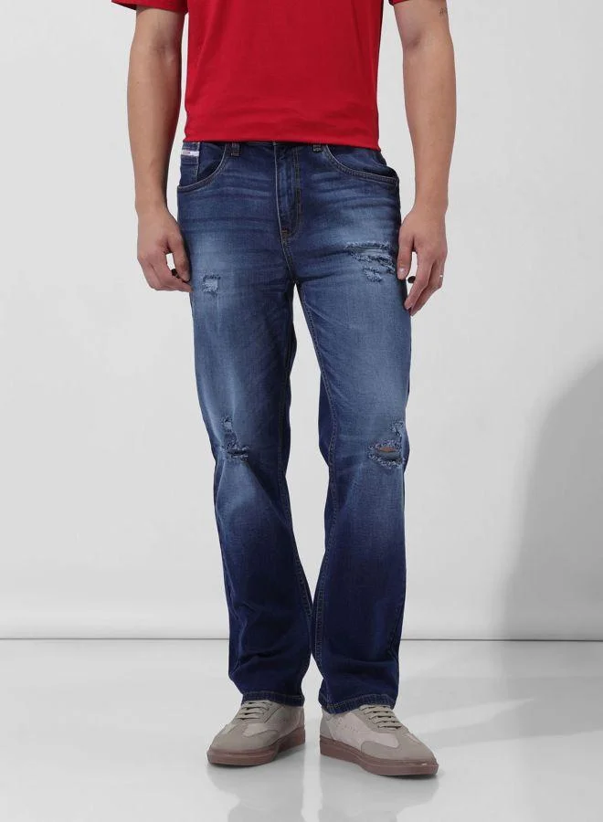 Men Regular Fit Solid Scoop Pocket Mid-Rise Jeans
